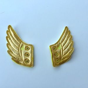 Two golden wing shwing shoe lace accessories